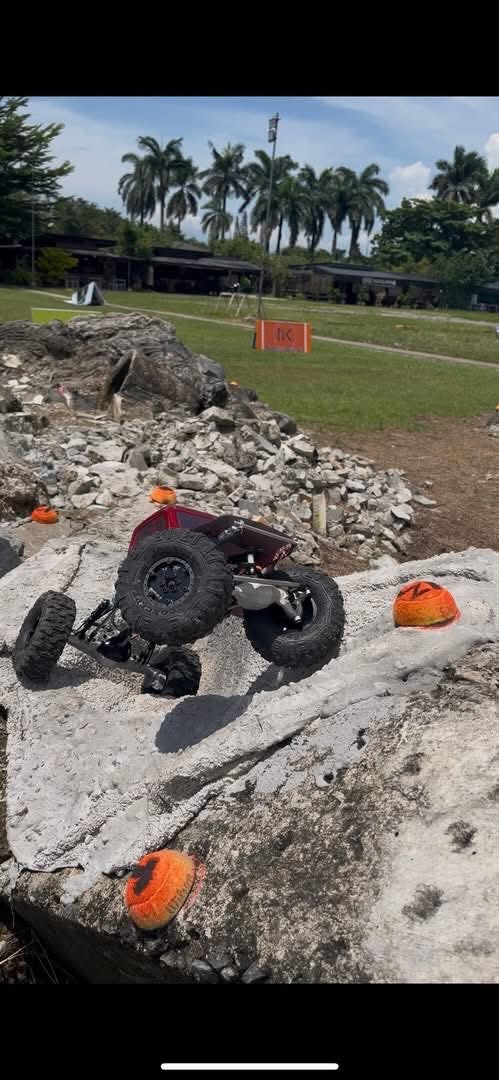 RC crawler navigating concrete rubble section at AYRC Ayala Northpoint