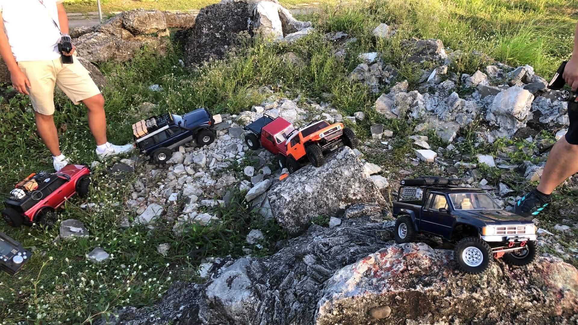 Multiple RC crawlers parked on rocky section at AYRC Bacolod community session