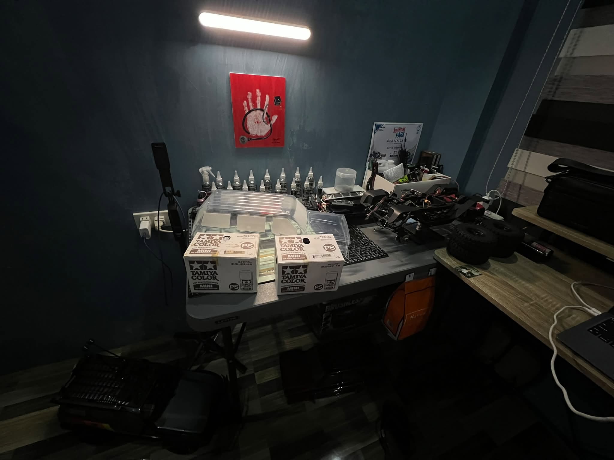 Overview of Raven Rigworks workshop in Baliuag Bulacan showing full workbench setup and organized RC crawler servicing area